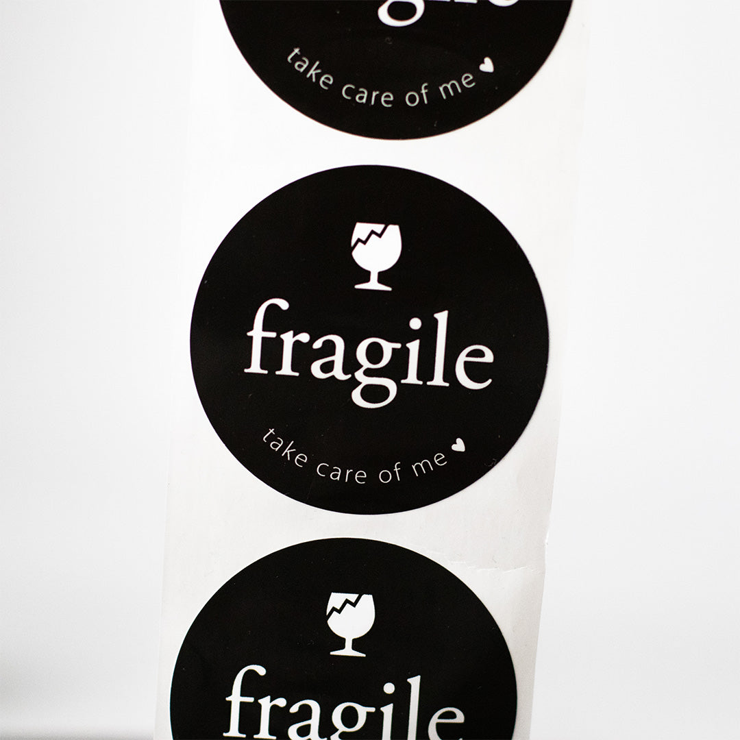 Etiketten „fragile – take care of me“